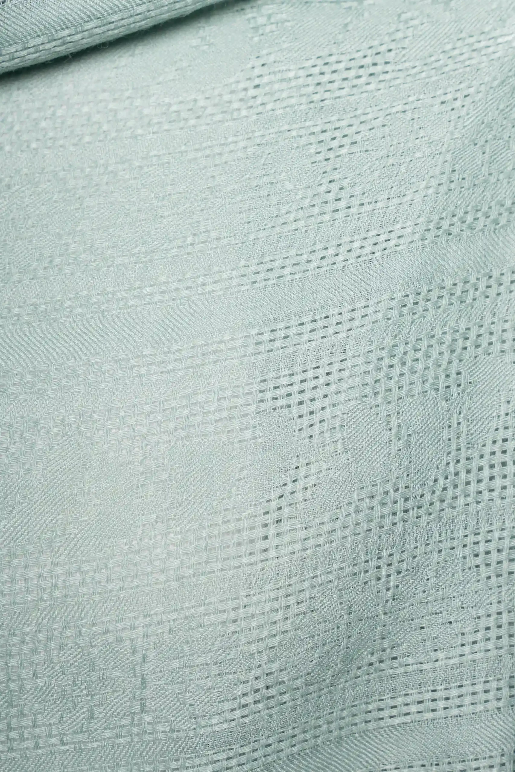 Textura de chal de baby alpaca en verde menta con tejido jacquard
